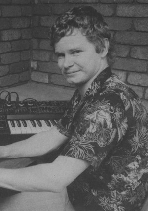 Photo of Greg Barnett at his computer